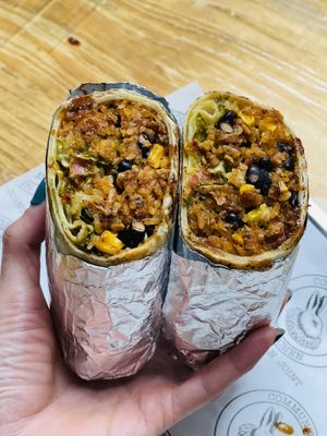 Vegan burrito - tofu crumbles- bbq sauce - guacamole - pico de Gallo - beans - rice - medium spicy   at The Community Kitchen in Panama City