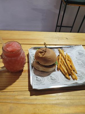 Black bean burger, fries, and strawberry smoothie at The Community Kitchen in Panama City