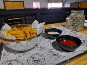 Regular fries with tahini & ketchup at The Community Kitchen in Panama City