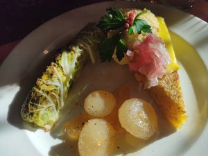 Starter: polenta and chickpea hummus, onions and cabbage roll at Granozero in Lecco