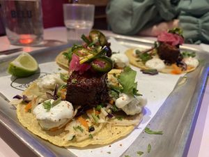 BBQ Short ‘Rib’ Tacos
Sticky glazed ‘ribs’, BBQ sauce, slaw, pink onions,
pickled jalapeños, garlic mayo on a soft corn tortilla  at Club Mexicana - Spitalfields in East London