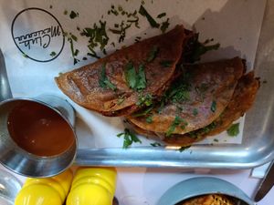 Birria tacos and dipping sauce at Club Mexicana - Spitalfields in East London