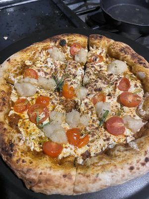 The best pizza cheese I’ve ever had  #Veganuary at Pizzeria Distrito Vegano in Merida