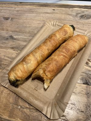 Spinach burek and half eaten potato burek   at Backstube Tromsoe in Tromsoe