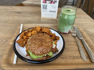 Big wild burger (quite nice, but not really a burger due to the Planted chicken) and Strawberry matcha with peas mylk (nice and fresh)  at Wild & The Moon - Arnold Schönberglaan in Amsterdam