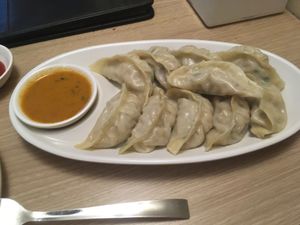 Steamed momos  at The White Lotus Cafe - Gairidhara in Kathmandu
