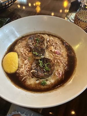 MASCOTTE
Blackened king oyster mushroom, "scallops", sweet potato grits, crispy onion, pan sauce  at La Setima Club in Tampa