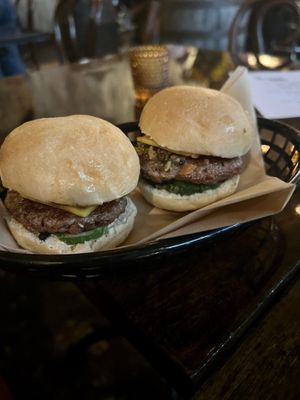 LIL BIG MUFF
A muffelatta inspired slider, impossible, olive spread, roasted red pepper, smoked "provelone", remoulade, on lil burger buns  at La Setima Club in Tampa