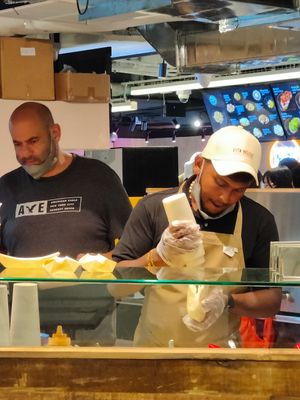 preparing my falafel sandwich at Pita House - Republic Plaza in Central Singapore