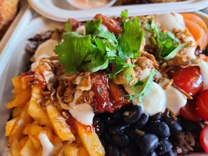 Korean BBQ chicken, beans and rice at Pow Pow - I St NW  in Washington