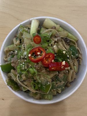 Dan dan carbonara with sautéed peppers and green onions, vegan beef crumbles, and a delicious creamy carbonara sauce  at Pow Pow - I St NW  in Washington
