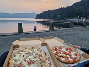 The pizza on the right side was the margherita pizza with buffalo mozzarella  (vegetarian, not vegan). Was very good! at La Terrazza in Hakone