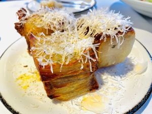 Truffle potatoes w/ shaved parmesan  at Crossroads Kitchen in Calabasas