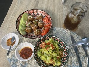 Falafel plate and couscous salad with sauces. Iced tea    at Koren's Restaurant - Maybe closed in Puerto Galera