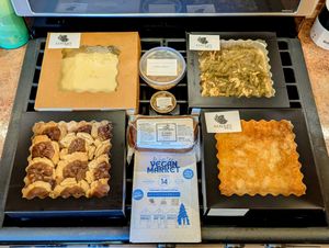 Thanksgiving catering! Including green bean casserole, "chicken" pot pie, pumpkin cobbler, and pecan pie cookies (as well as a "ham" roast by Little Devil Meats). at Azalea's Bakery in Boise