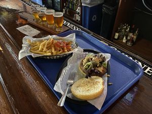 Black bean burger with Cajun fries and a flight of Oktoberfest   at The Burger Stand in Topeka