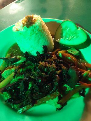 Garlic tofu with dried mushrooms and rice at Villa Potenciana Restaurant in Malapascua Island