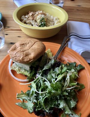 Cheeseburger, house salad with ranch, and Mac n cheese with coconut bacon at Cafe Gratitude in Kansas City