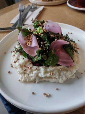 Daily special with pickled and fresh greens on a bean dip. at Wild Horses in Copenhagen