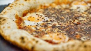 TARTUFAST TOO FURIOUS
Ingredients: San Marzano tomato, fior di latte mozzarella, camembert cream, 6 quail eggs and freshly grated melanosporum truffle. at Pizzería Luca Brasi in Madrid