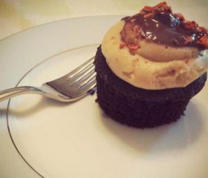 A peanut butter crunch cupcake. Right before I devoured it. at Capital City Bakery in Austin