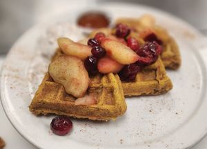 Pumpkin waffles with apple and cranberry (vegan!) at The Hungry Pug Cafe in Kenora
