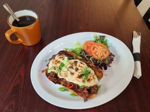 Today's special- vegan Philly cheesesteak sandwich- shown with no side but comes with choice of side too! at The Hungry Pug Cafe in Kenora
