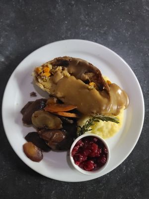 Stuffed beast from the good butchers with tri colored carrots and mashed potatoes- from a special event 4-course dinner - vegan options were totally available and delish at The Hungry Pug Cafe in Kenora