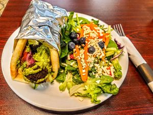 Falafel with their in-house s'rug sauce and a Pug salad (no dressing today) - classically delish at The Hungry Pug Cafe in Kenora