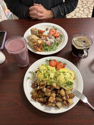 Vegan steak ‘n’ egg burrito, classic benny made vegan, 16oz passion berry smoothie, americano  at The Hungry Pug Cafe in Kenora