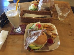 Vegan fish burger with baked potatoes and salad. Also a great banana shake. at Morpho Cafe in Kyoto