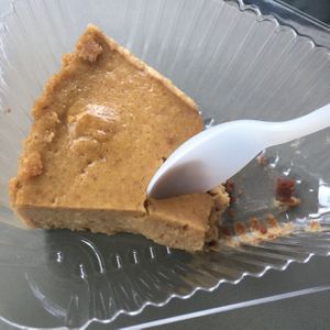 Pumpkin Cheesecake. Filled with flavor, but the crust was strange. Oily and gritty, but not in a bad way. Pricey, so I would pass, unless you love pumpkin. at Real Food Daily - Pasadena in Pasadena