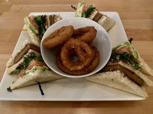 Club sandwich with onion rings  #Veganuary at Real Food Daily - Pasadena in Pasadena