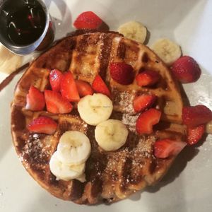waffle with strawberries and bananas at Real Food Daily - Pasadena in Pasadena