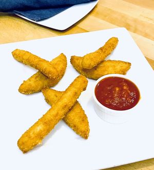 Perfect vegan mozzarella sticks ❤️  at Real Food Daily - Pasadena in Pasadena