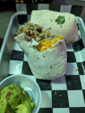 Vegan burrito. Sorry it took a bite. 😅 at The Tavern Bar & Grill in Orlando
