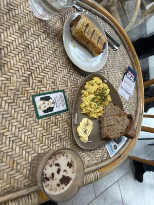 scrambled tofu, sausage roll and hot chocolate   at WAVE in North London