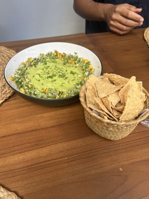 This guac was HUGE and so good we got two more baskets of chips!  at Good Karma  in San Salvador