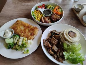 L-R: 'fish' steak, burger, and 'pork' belly with 'egg'. at KHUN VEGAN in Khon Kaen