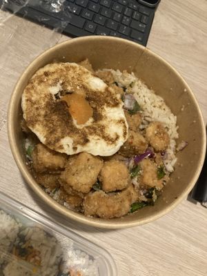 Spicy chicken rice with added fried egg  at KHUN VEGAN in Khon Kaen