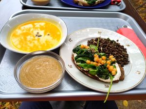 Full lunch menu: pumpkin velouté, ricotta and spinach tartine with lentil salad and panacotta at Les Halles de la Transition in Toulouse