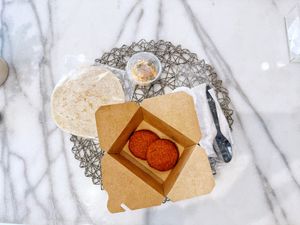 Quinoa fritters with hummus  at Cleanse & Glow in Riyadh
