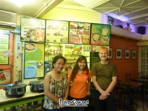 Maitri, Tanya, and Ole in front of the counter at Newpost in Iloilo City