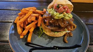 Mexican Vegan burger with sweet potato fries at Nineteen 89 Plett in Plettenberg Bay