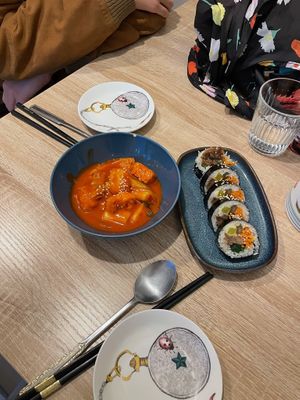 Spicy rice cake (left) and kimbap (right) at MukBap in London