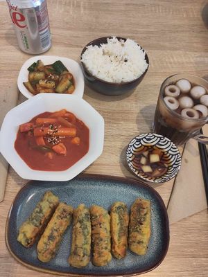 Tteokbokki, rice, cucumber kimchi , cripsy fried seaweed rolls and a coke zero at MukBap in London
