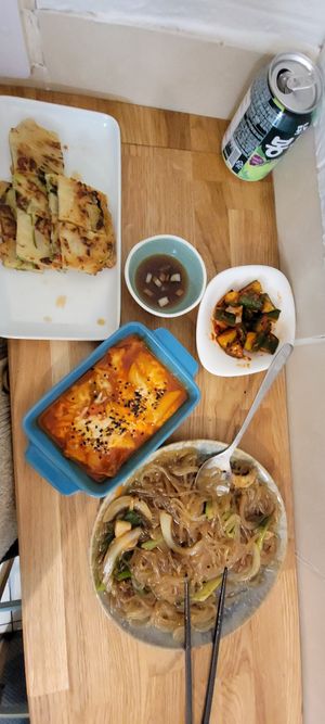 Tteokbokki, japchae, jeon,  cucumber kimchi, at MukBap in London