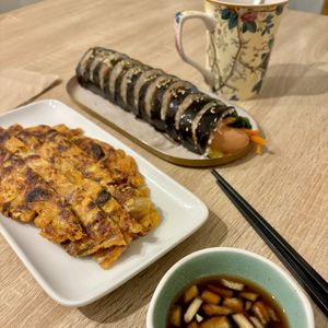 Kimchi pancake with fat roll and yuzu tea  at MukBap in London
