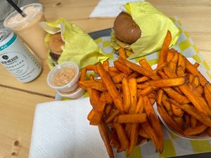 Burgers, shake, kombucha, and sweet potato friess  at Lucky Goose  in Albuquerque
