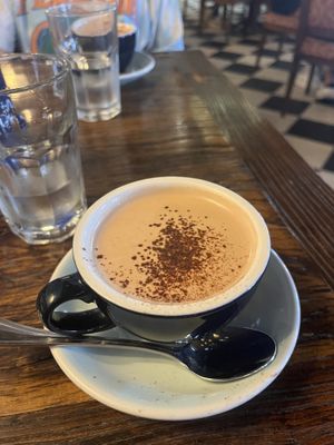 Chocolate con leche de almendras  at Época in Cartagena